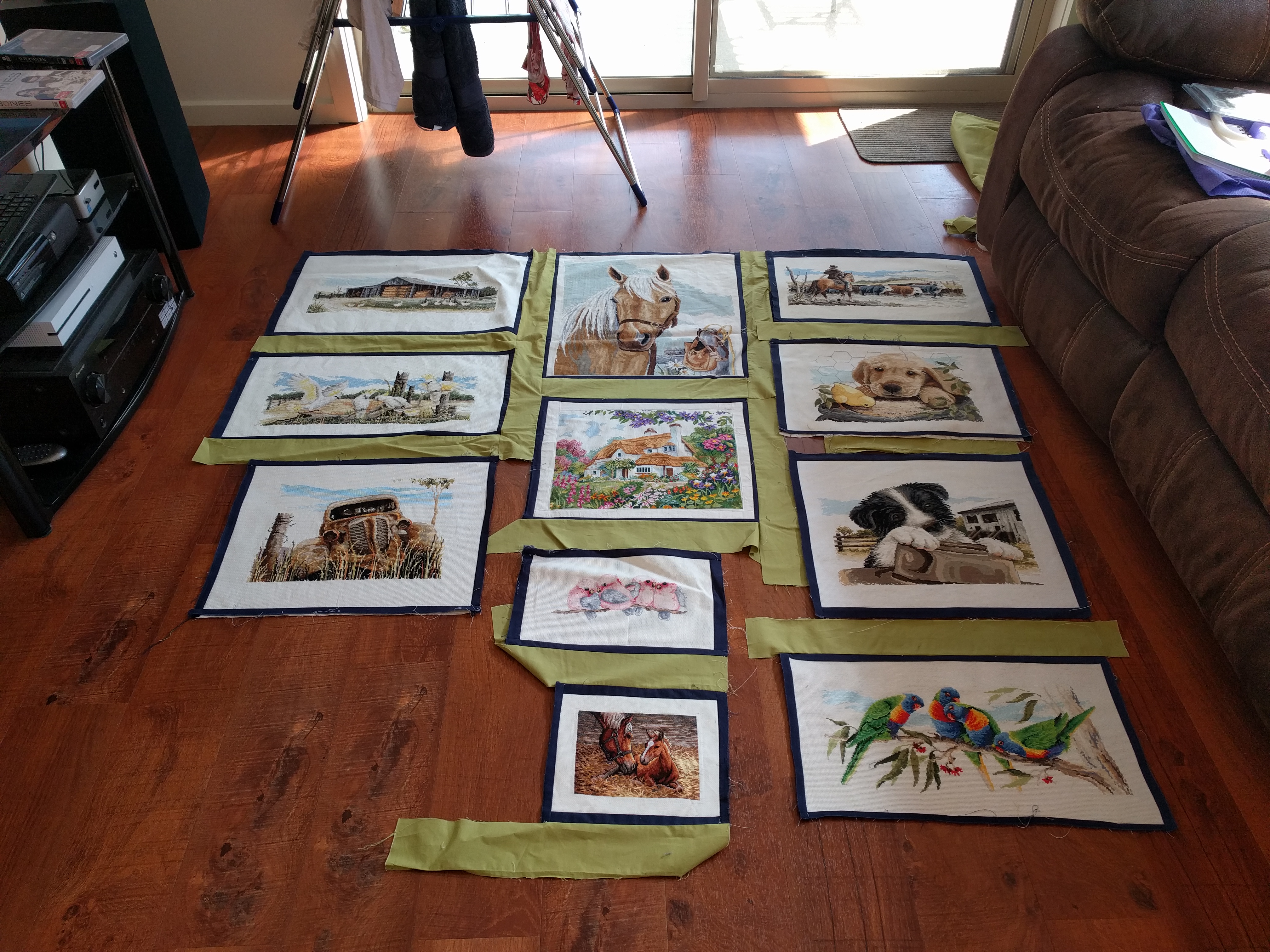 Quilt layout option 2. Row 1 - left to right: Hay shed, palamino horse, droving cattle across a creek. Row 2 - left to right: cockatoos, English cottage, labrador puppy with chick.
Row 3 - left to right: Rusty car, galahs, border collie.
Row 4 - left to right: mare and foal, Lorikeets.
